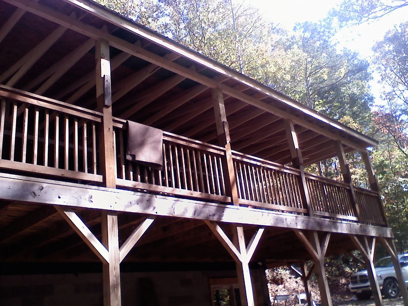 Timber framing under a new elevated porch and deck — Roof Leak Repair in Orrville by Roofing Brothers